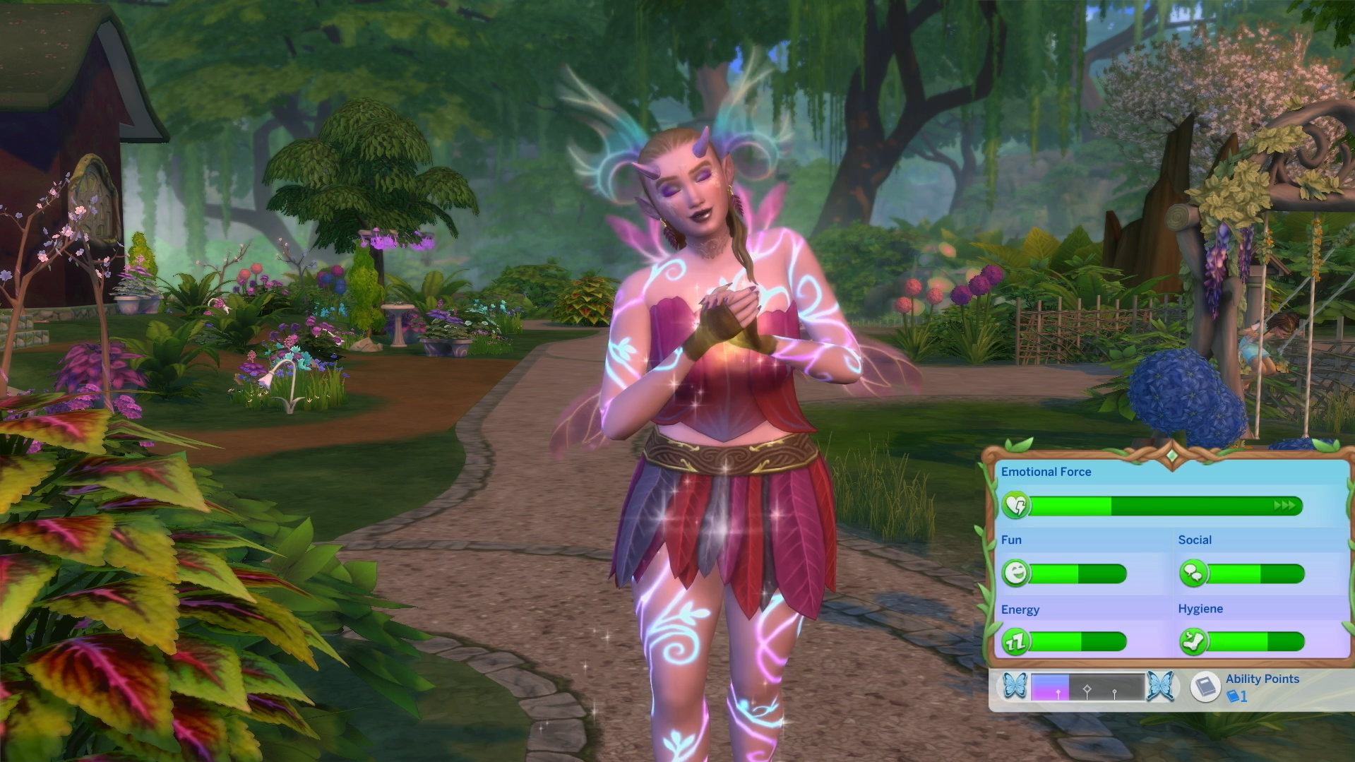 A glowing female fairy Sim smiles with joy in a magical forest, surrounded by sparkles, with her Emotional Force bar fully maxed out.